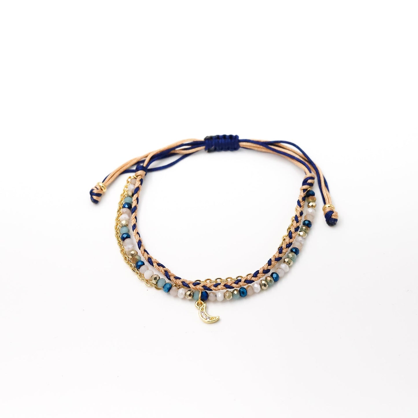Pulsera Julieta triple tonos beige y azul: arbolito, luna, elefante
