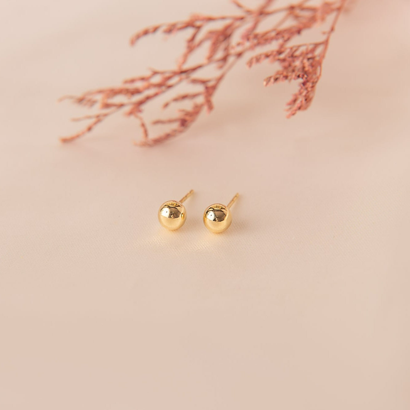 Aretes Bombita Oro 18K